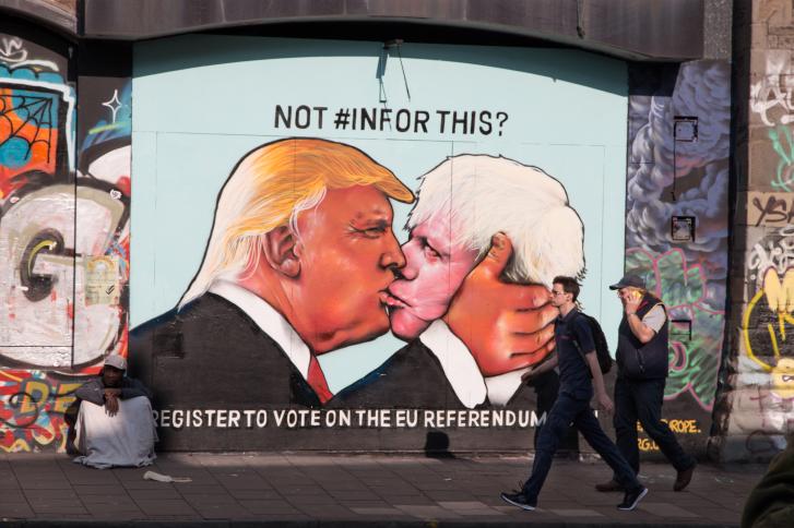 G266MN Satirical street art showing Donald Trump kissing Boris Johnson, to encourage people to vote in the 2016 EU referendum.